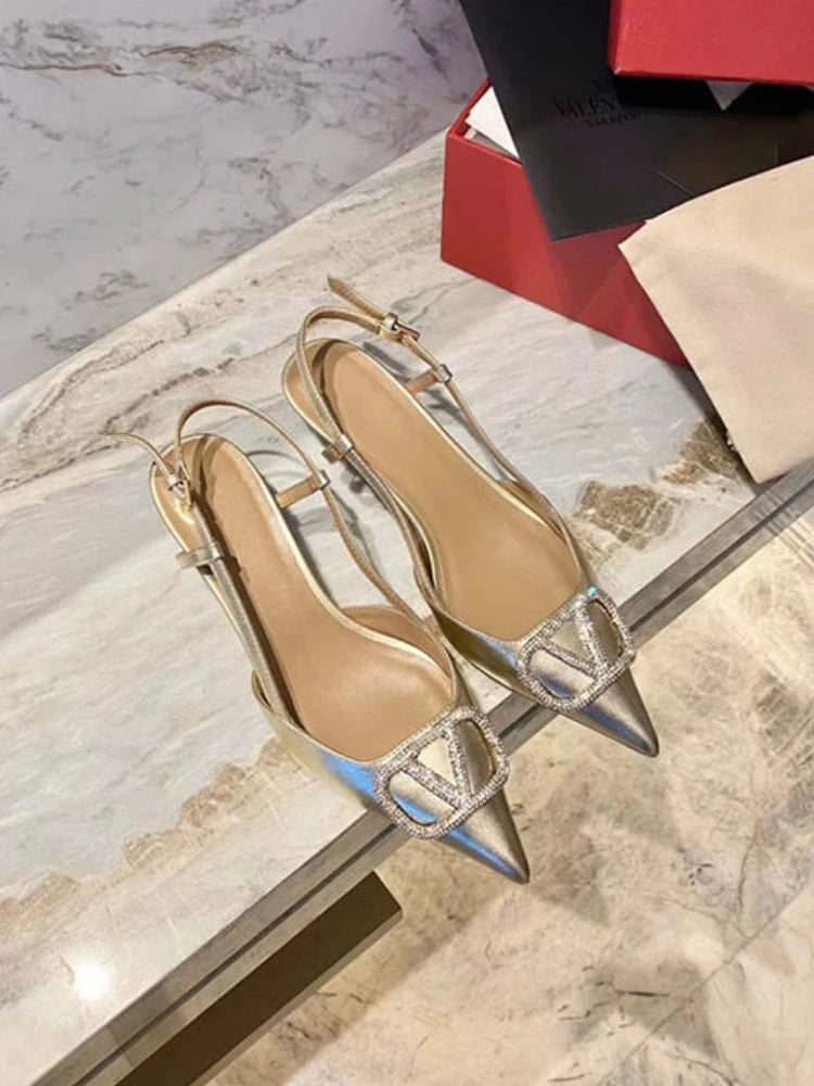 Rhinestone high heels with thin heels and pointed sandals