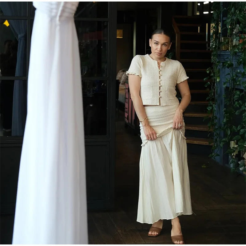 Elegant Ruffle Sleeve O Neck Wave Cut Chic